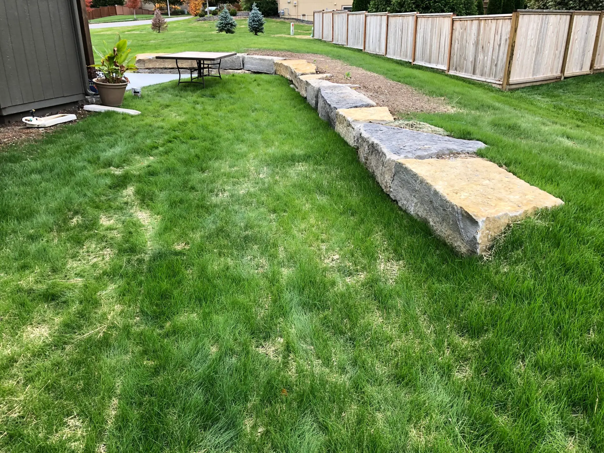 Natural limestone retaining wall landscape Johnson County