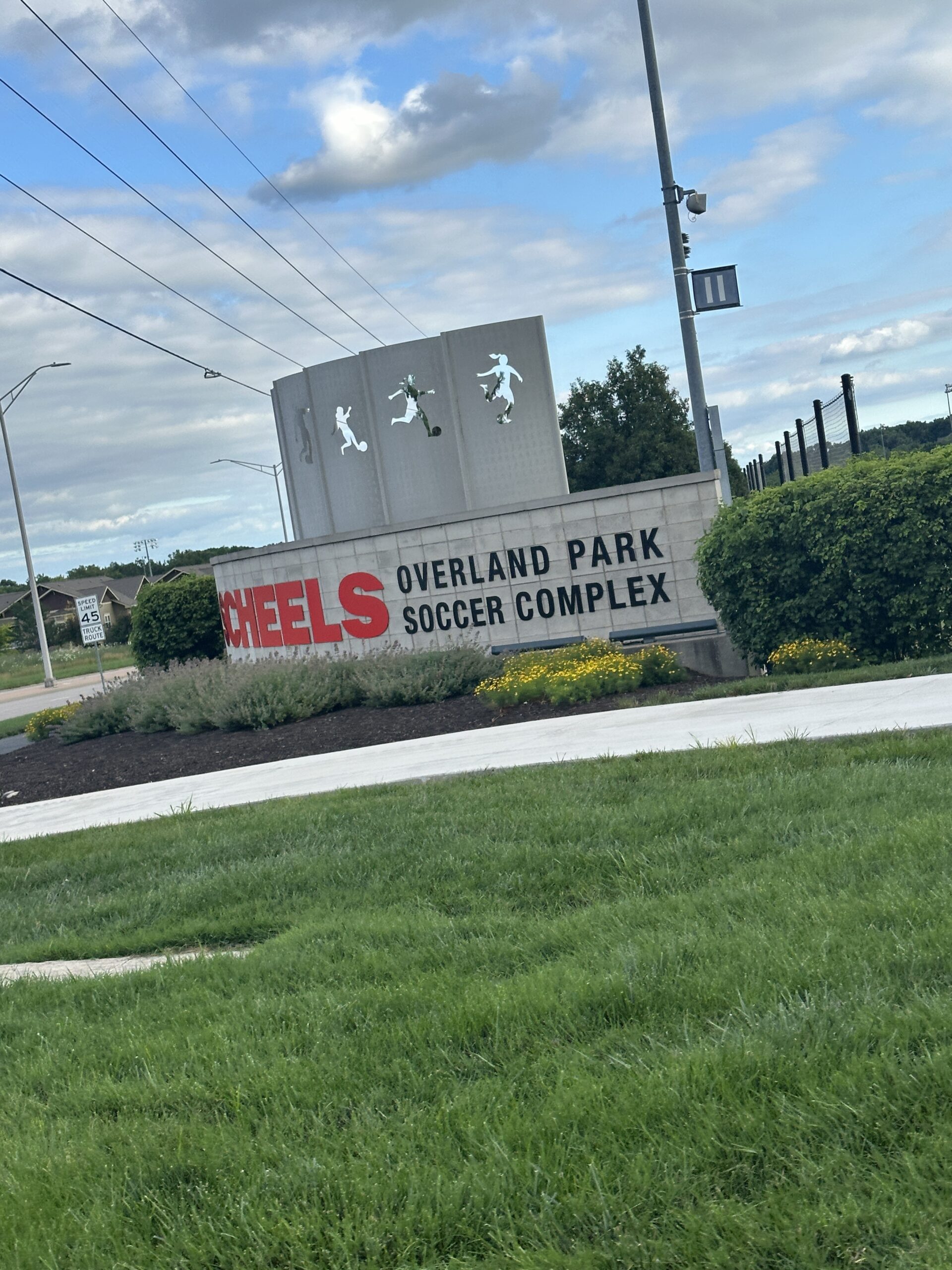 Maintained turf and entrance plantings at Scheels Overland Park Soccer Complex